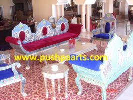 These are wooden sofa set covered with meenakari work done on embossed metal sheet